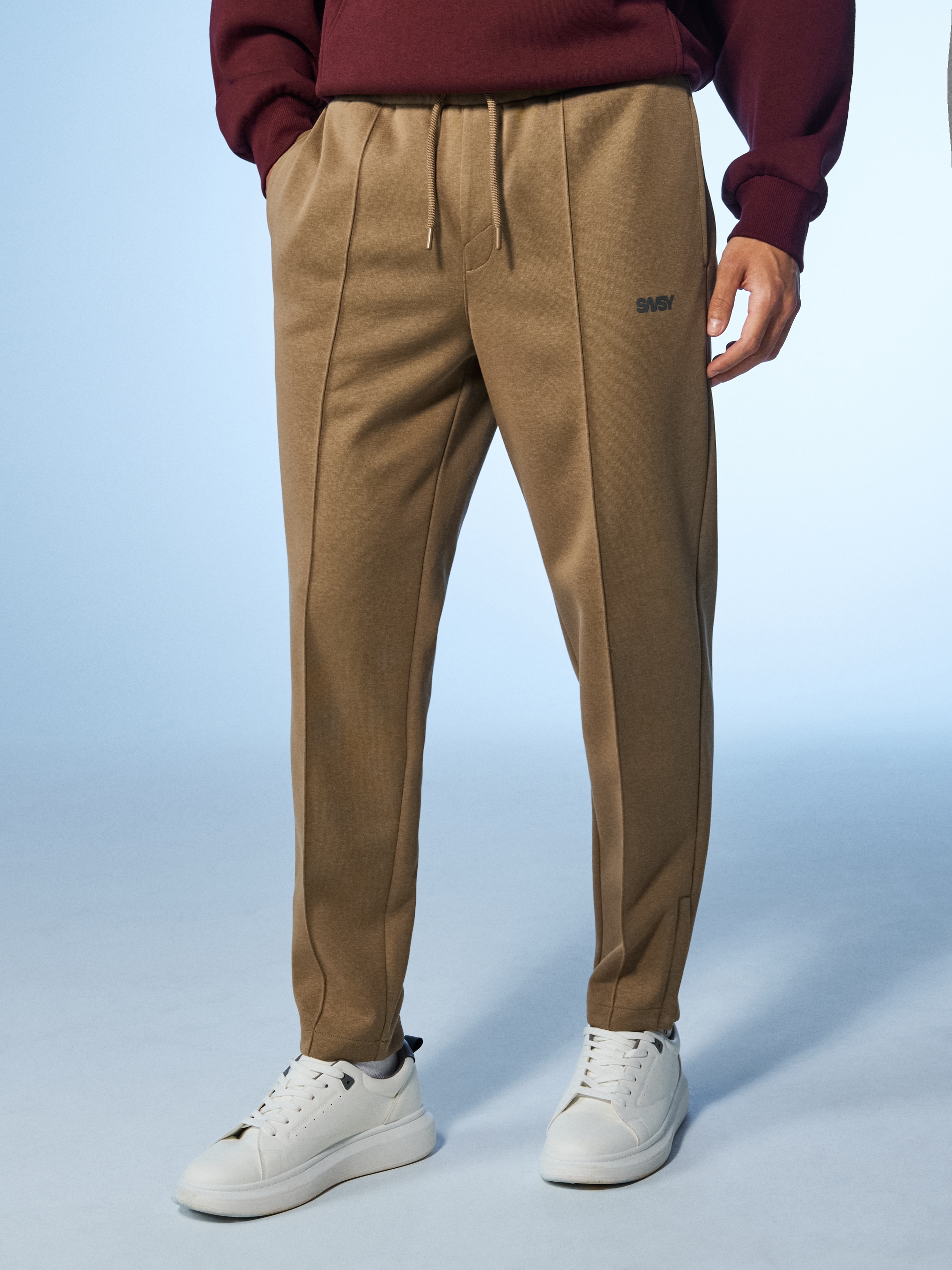 Sinsay - Spodnie tapered fit - beżowy