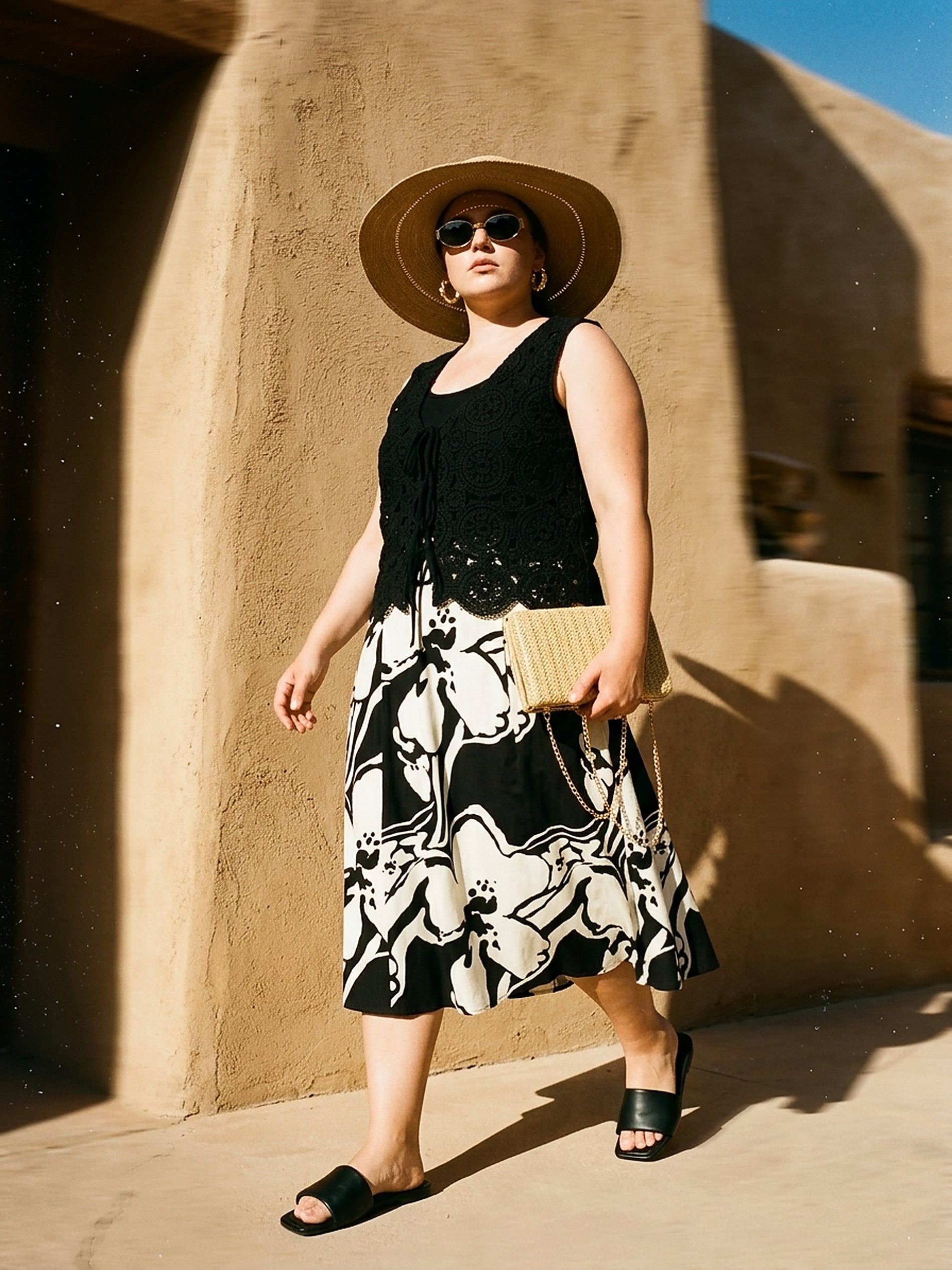 Sinsay - Rozkloszowana spódnica midi w kwiaty z wiskozą i domieszką lnu - wielobarwny