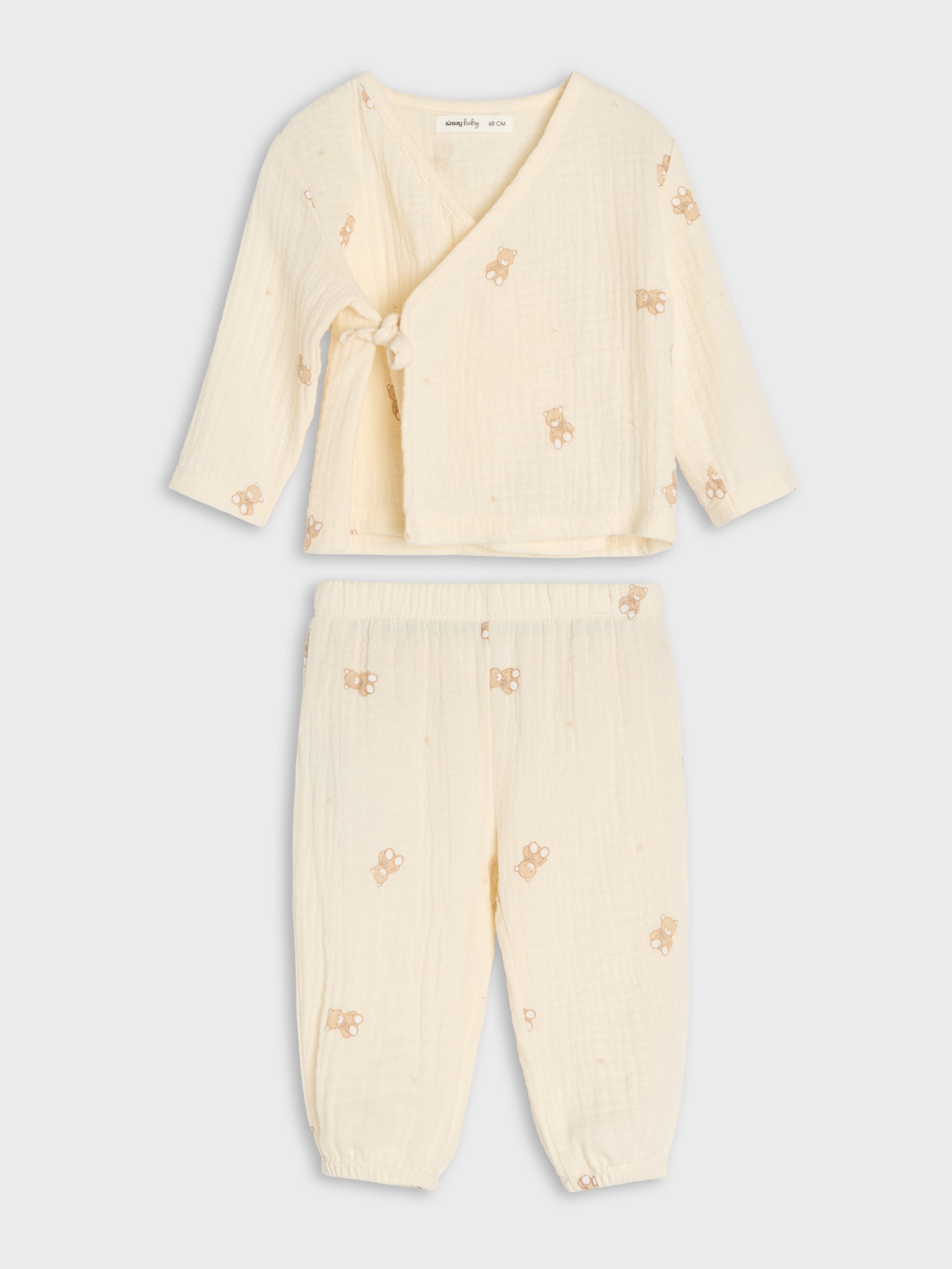 Sinsay - Bawełniany komplet: kopertowa bluzka i spodnie z motywem misiów - kremowy