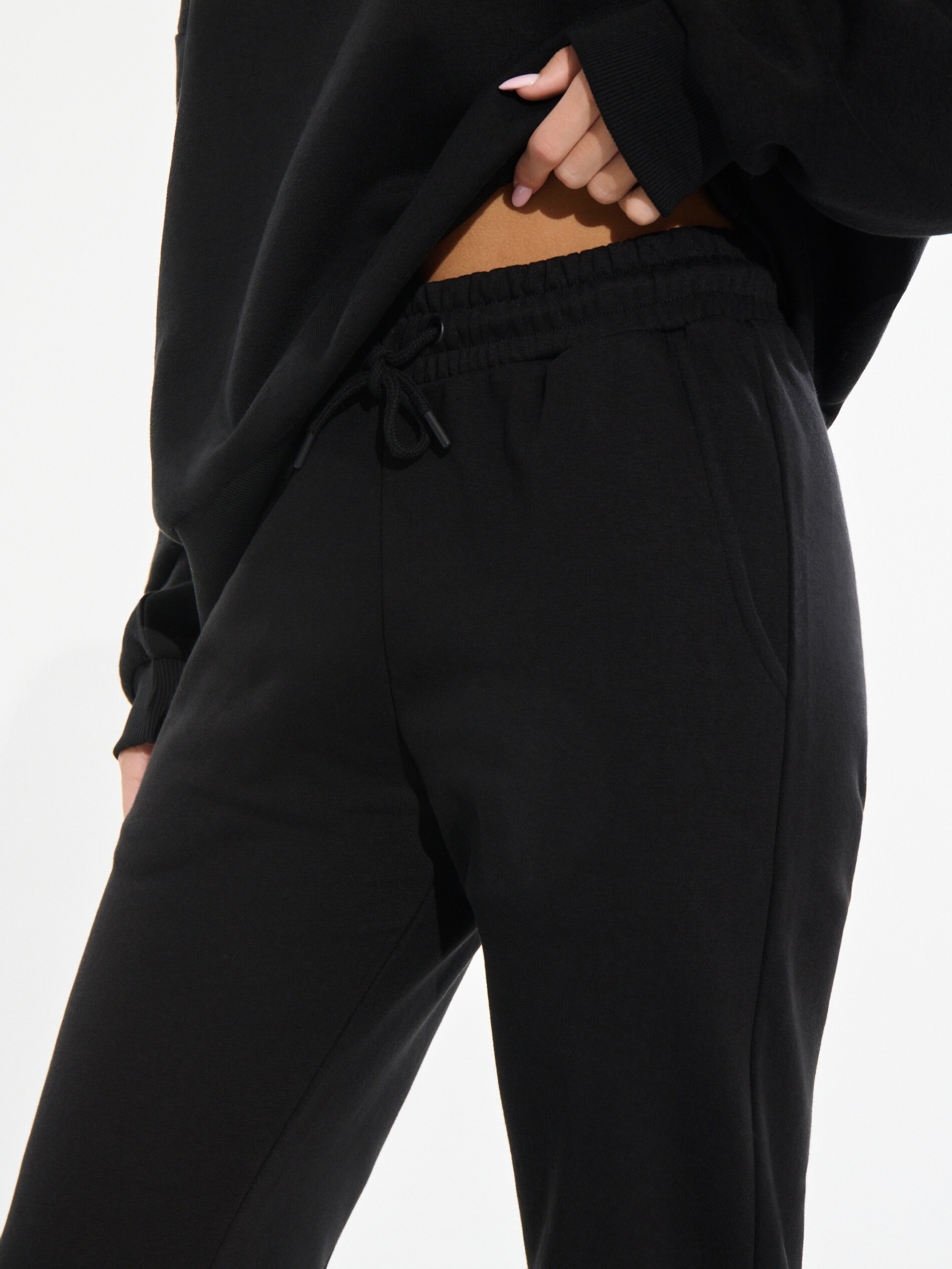 Sinsay - Παντελόνι φόρμας - μαυρο φωτογραφία