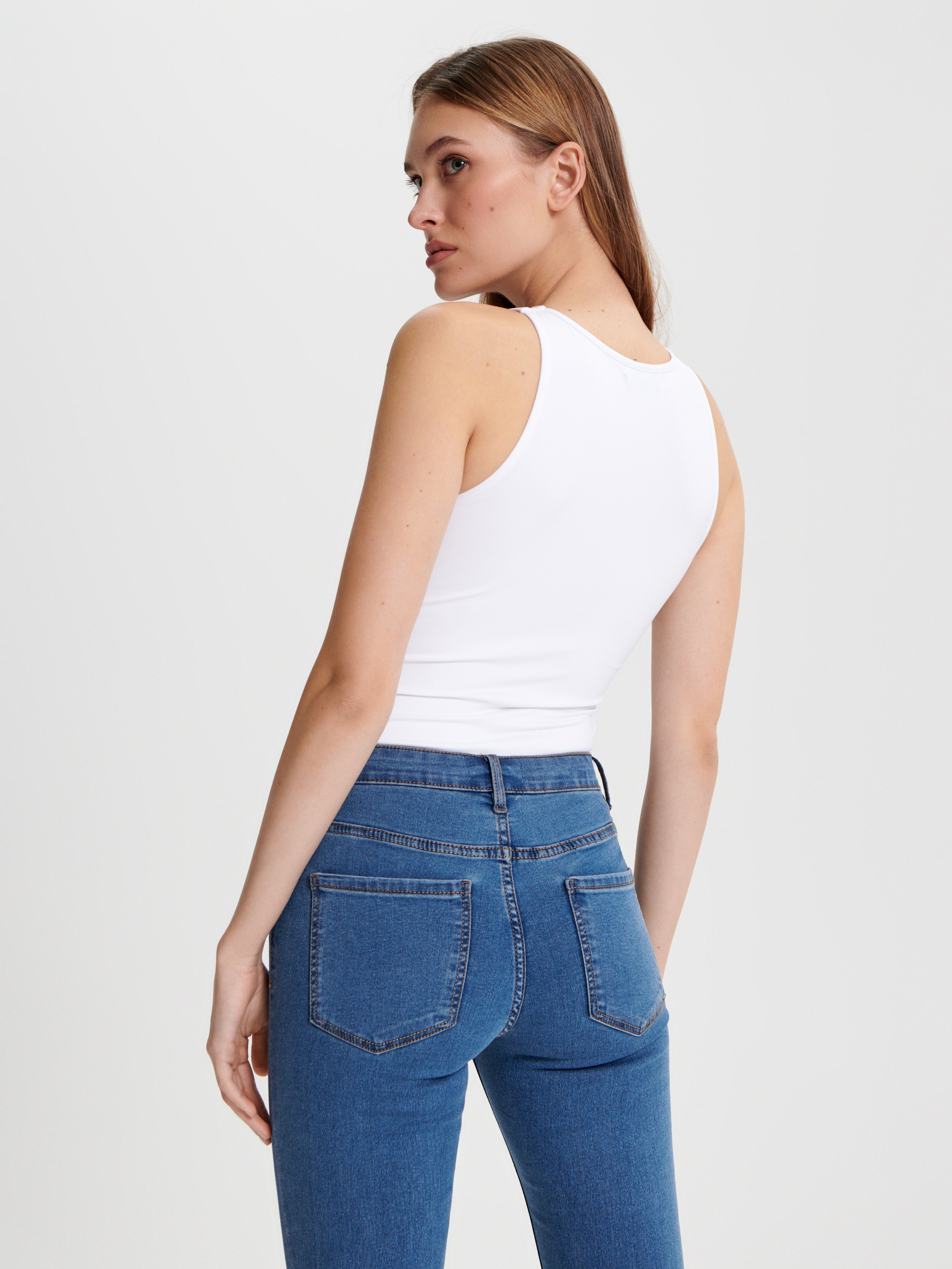 Sinsay - Τζιν παντελόνι skinny με κανονική μέση - μπλε τζιν φωτογραφία