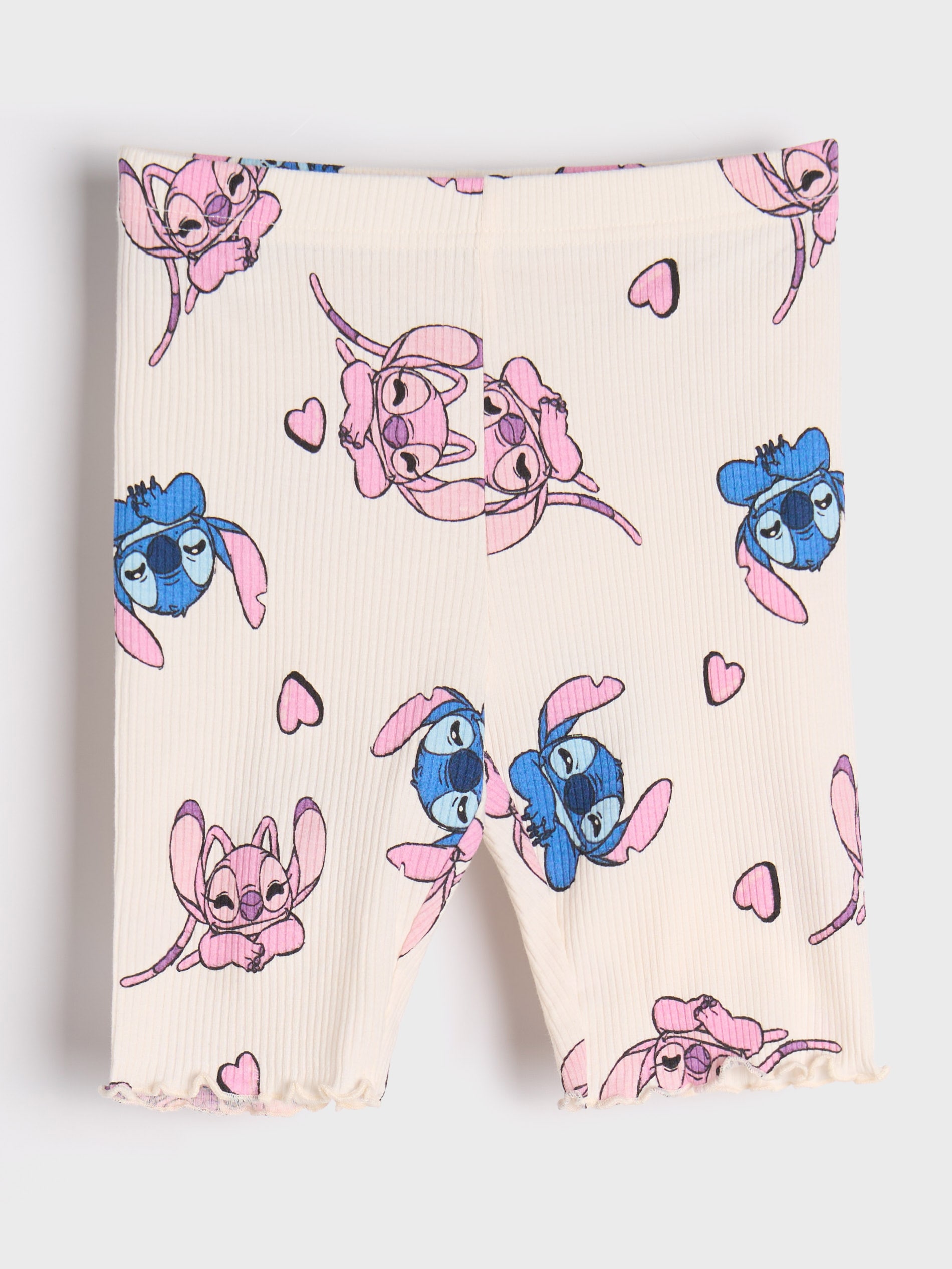 Sinsay - Krótkie legginsy Stitch - kremowy
