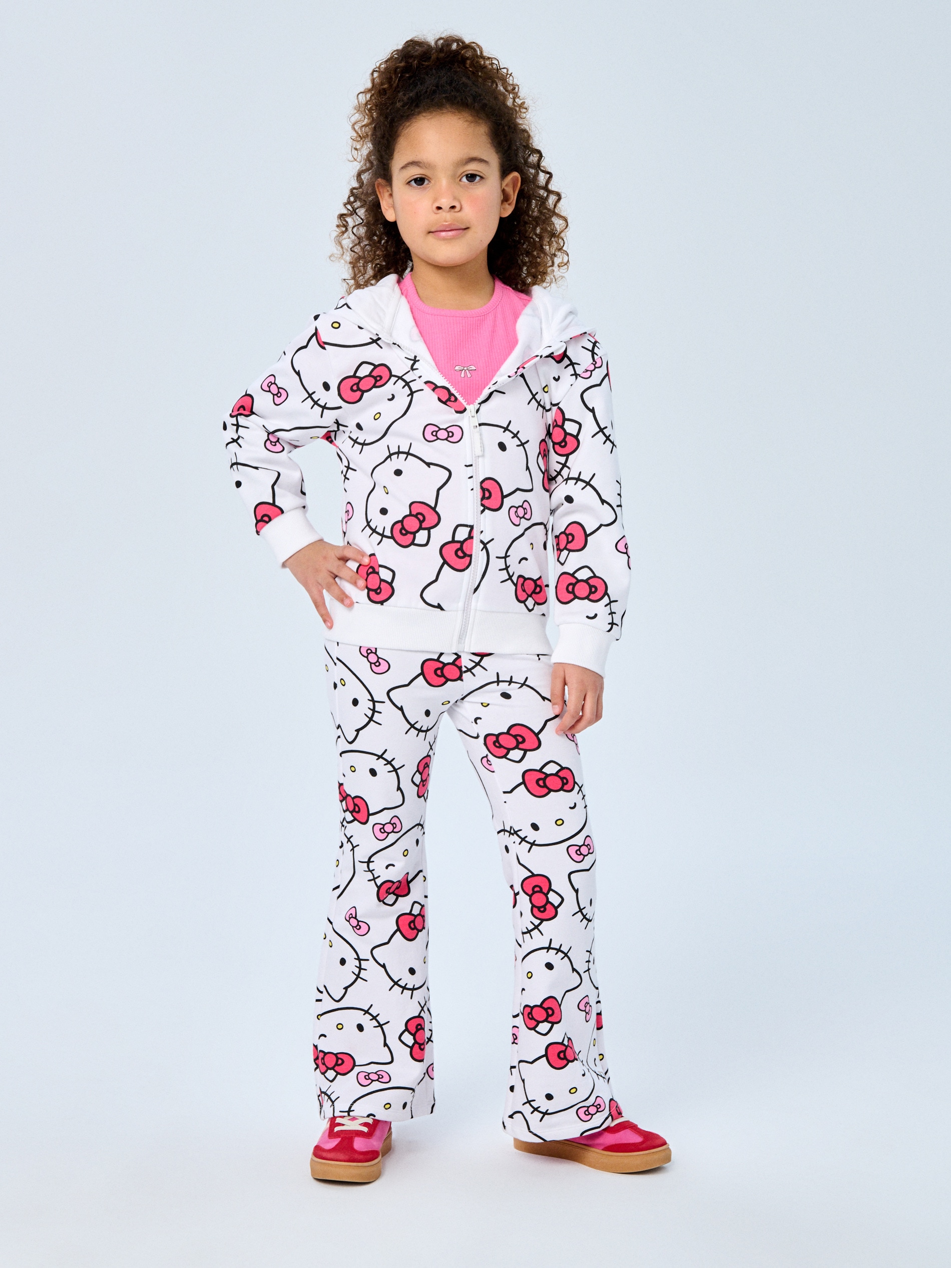 Sinsay - Spodnie flare ze wzorem Hello Kitty - biały