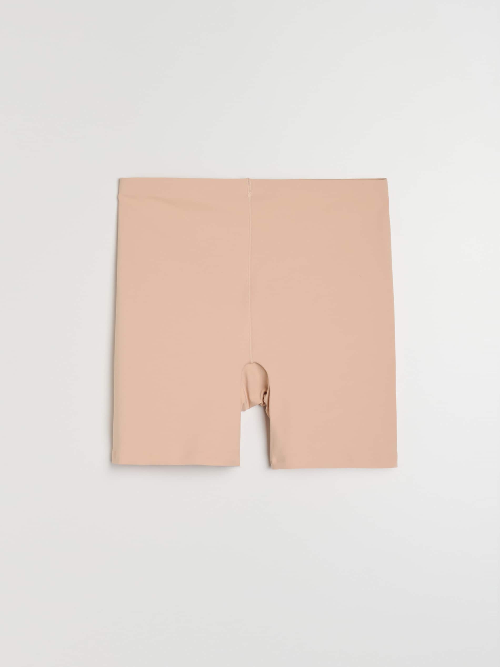 Sinsay - Szorty modelujące z silikonową taśmą na nogawkach - kremowy