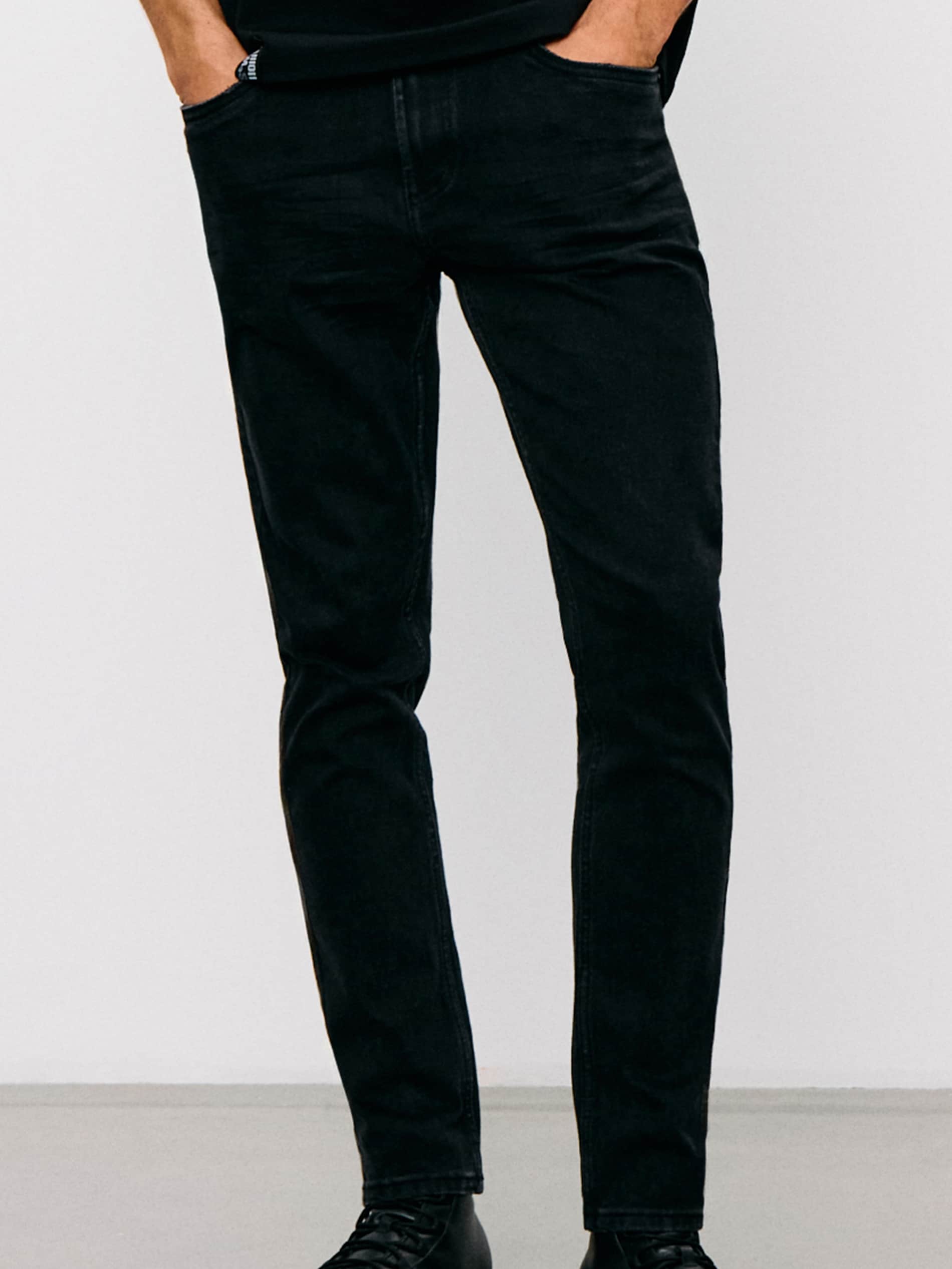 Sinsay - Jeansy cropped carrot fit - czarny