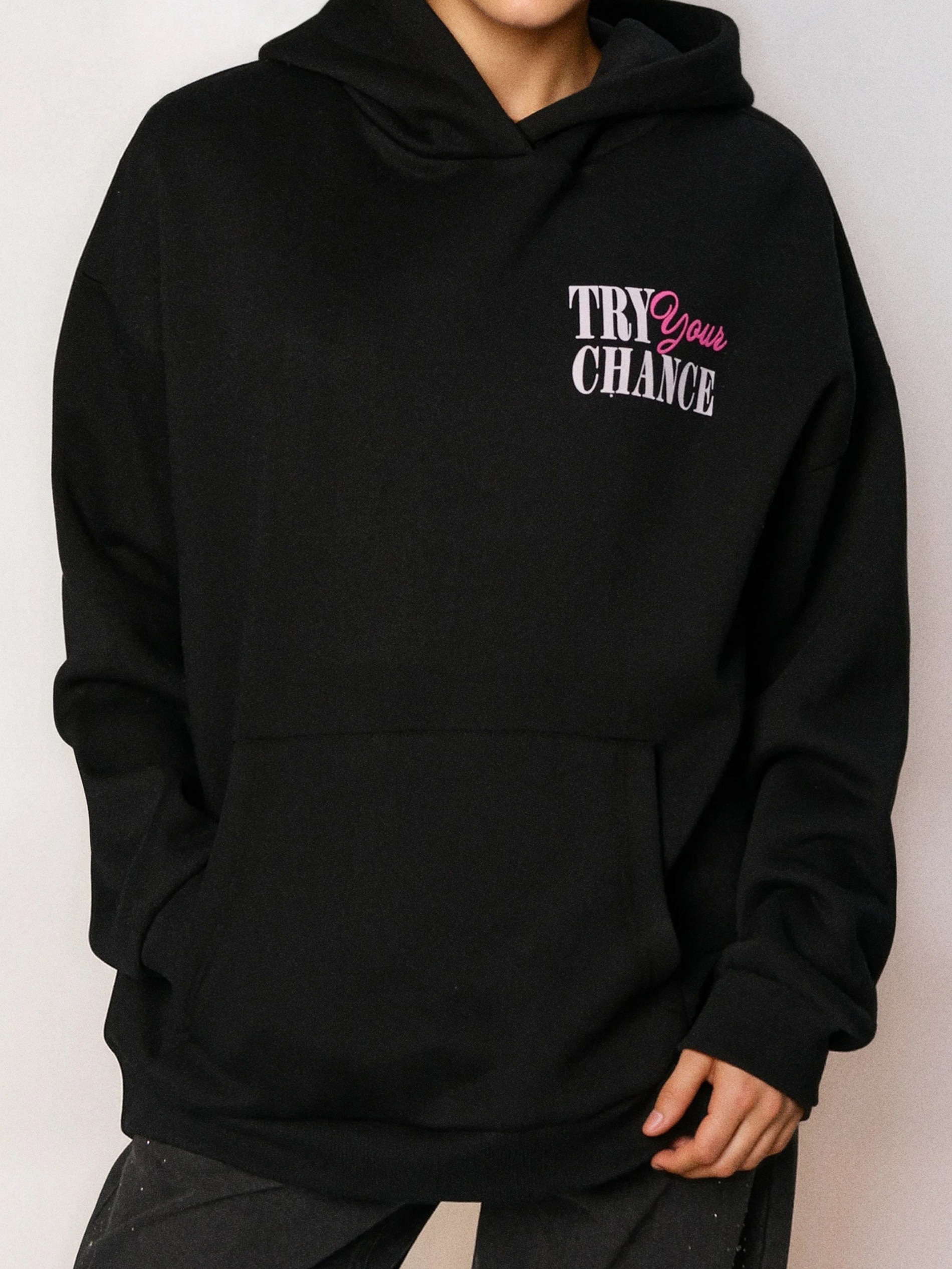 Sinsay - Bluza hoodie z nadrukiem na plecach - czarny