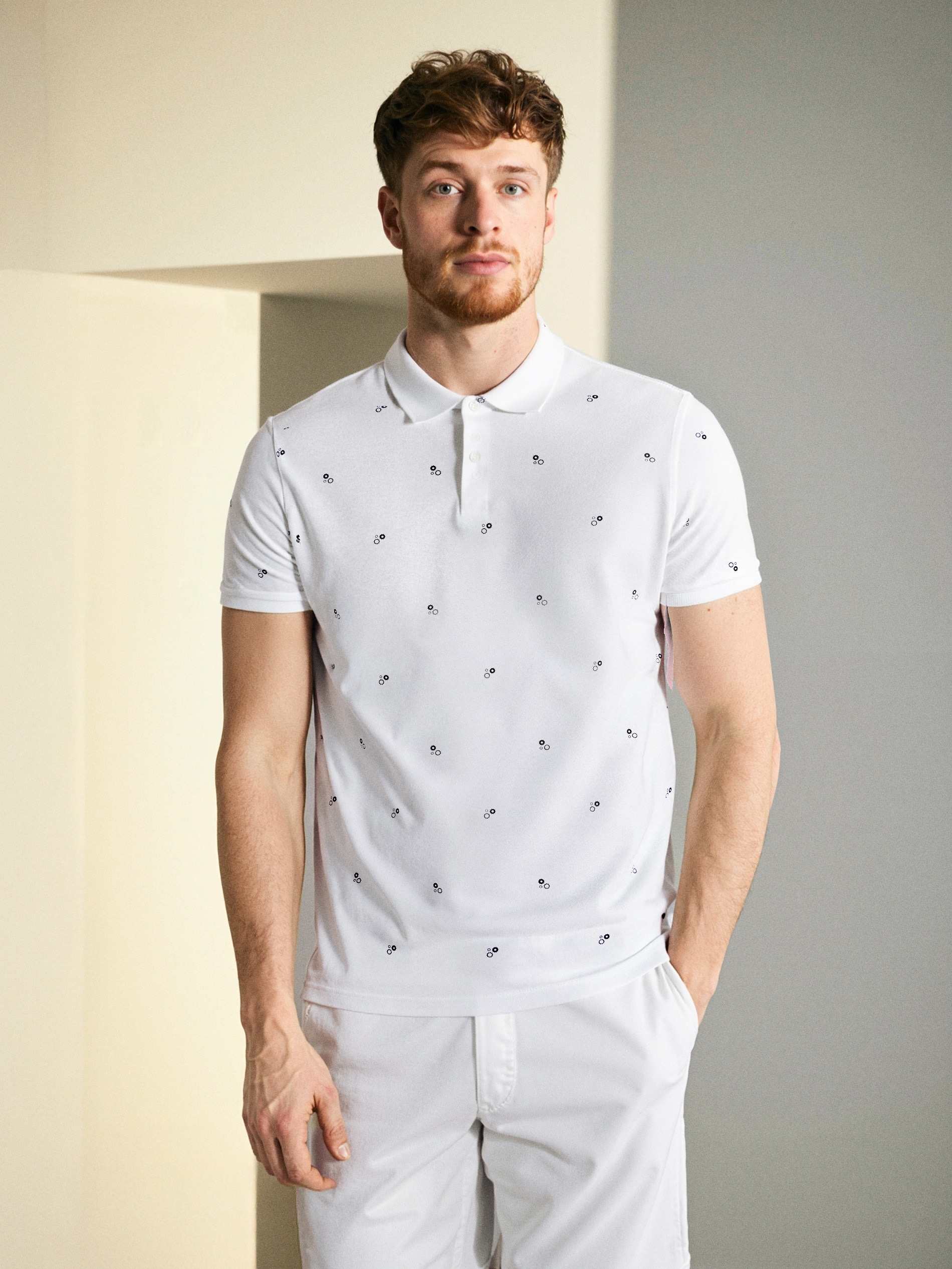 Sinsay - Μπλούζα πόλο με all-over εκτύπωση - λευκο φωτογραφία