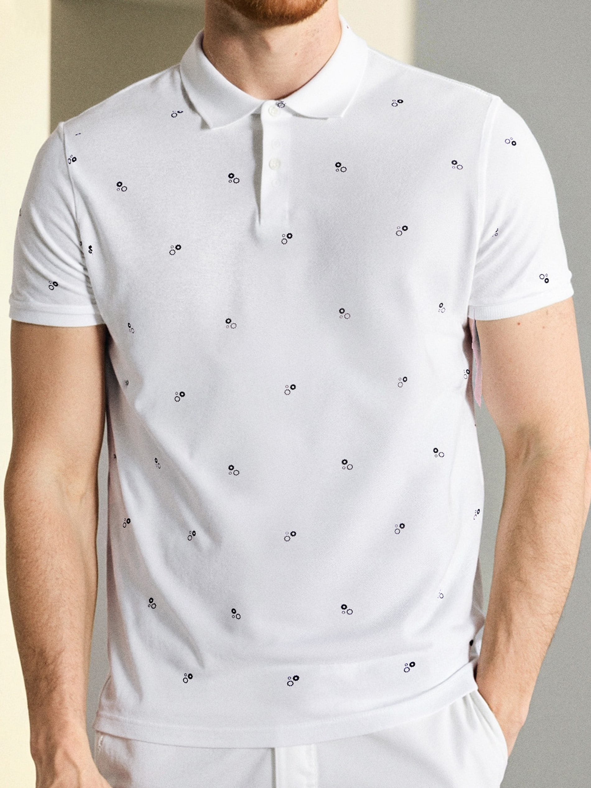 Sinsay - Μπλούζα πόλο με all-over εκτύπωση - λευκο φωτογραφία