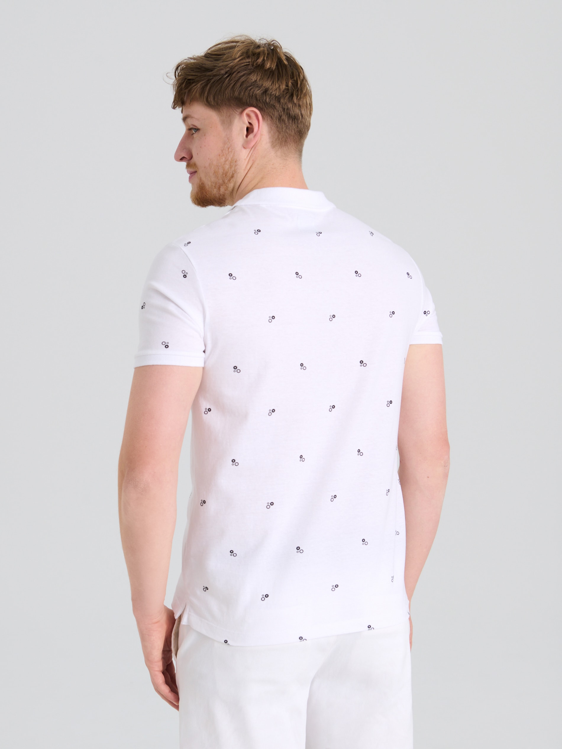 Sinsay - Μπλούζα πόλο με all-over εκτύπωση - λευκο φωτογραφία