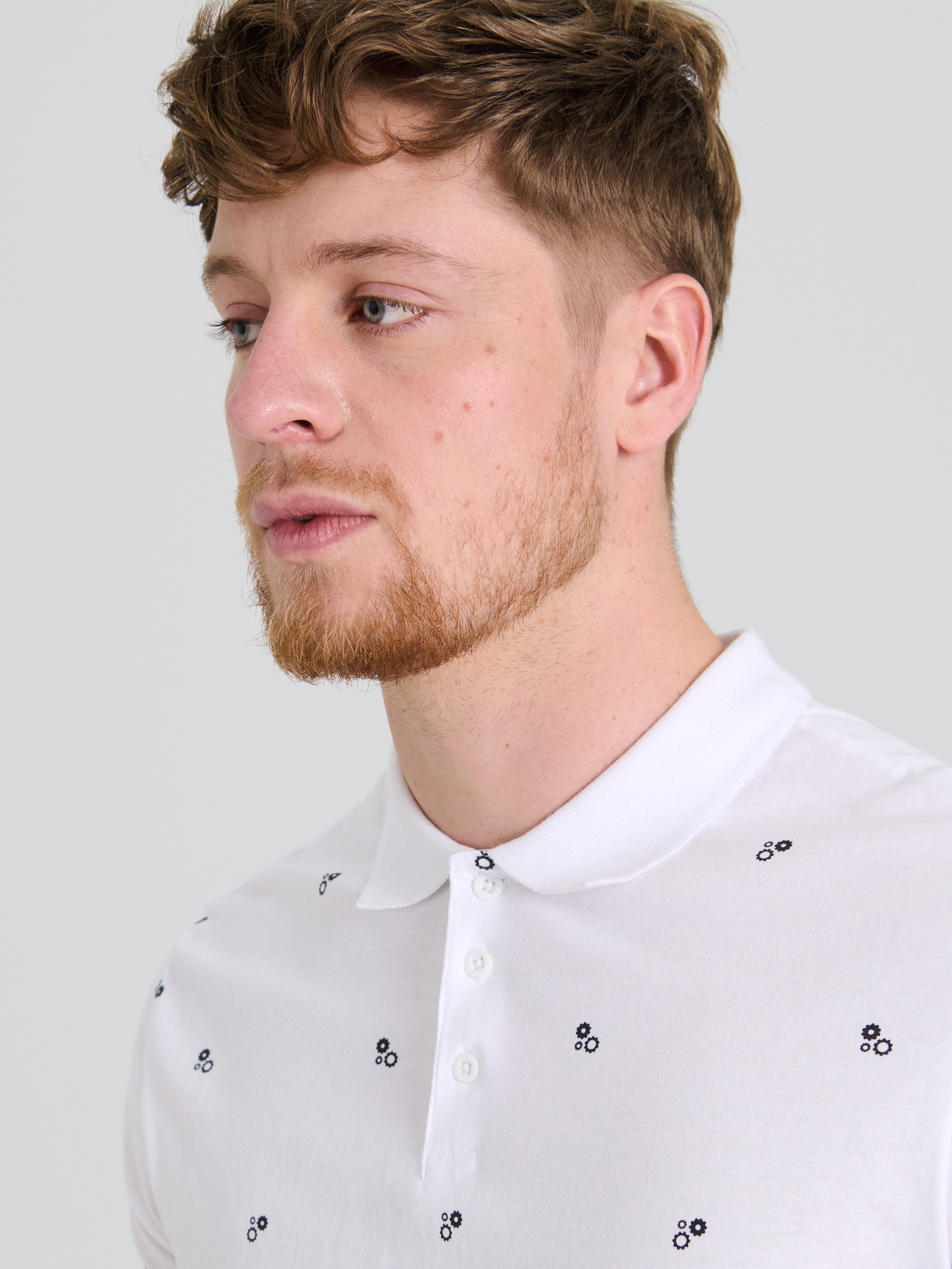 Sinsay - Μπλούζα πόλο με all-over εκτύπωση - λευκο φωτογραφία