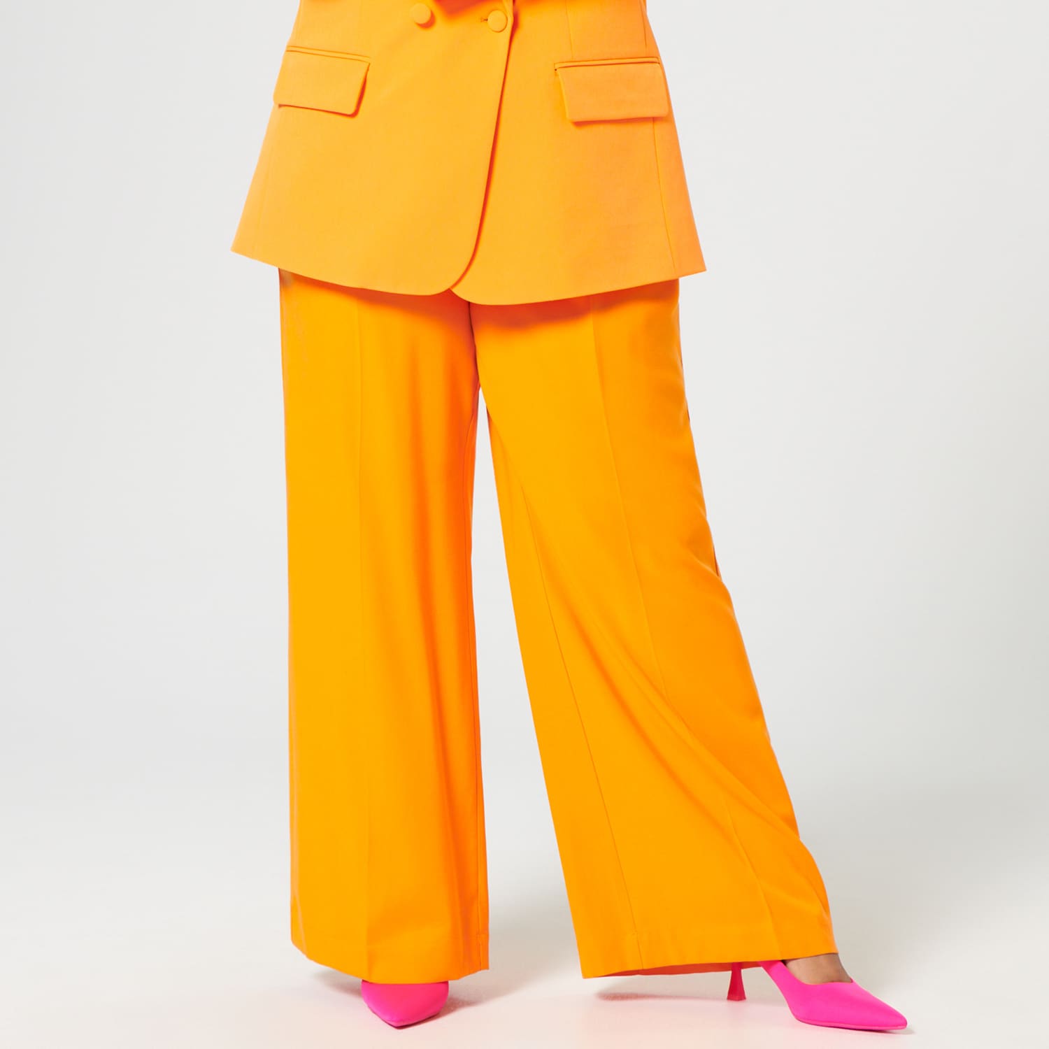 E-shop Sinsay - Oblekové nohavice - Oranžová