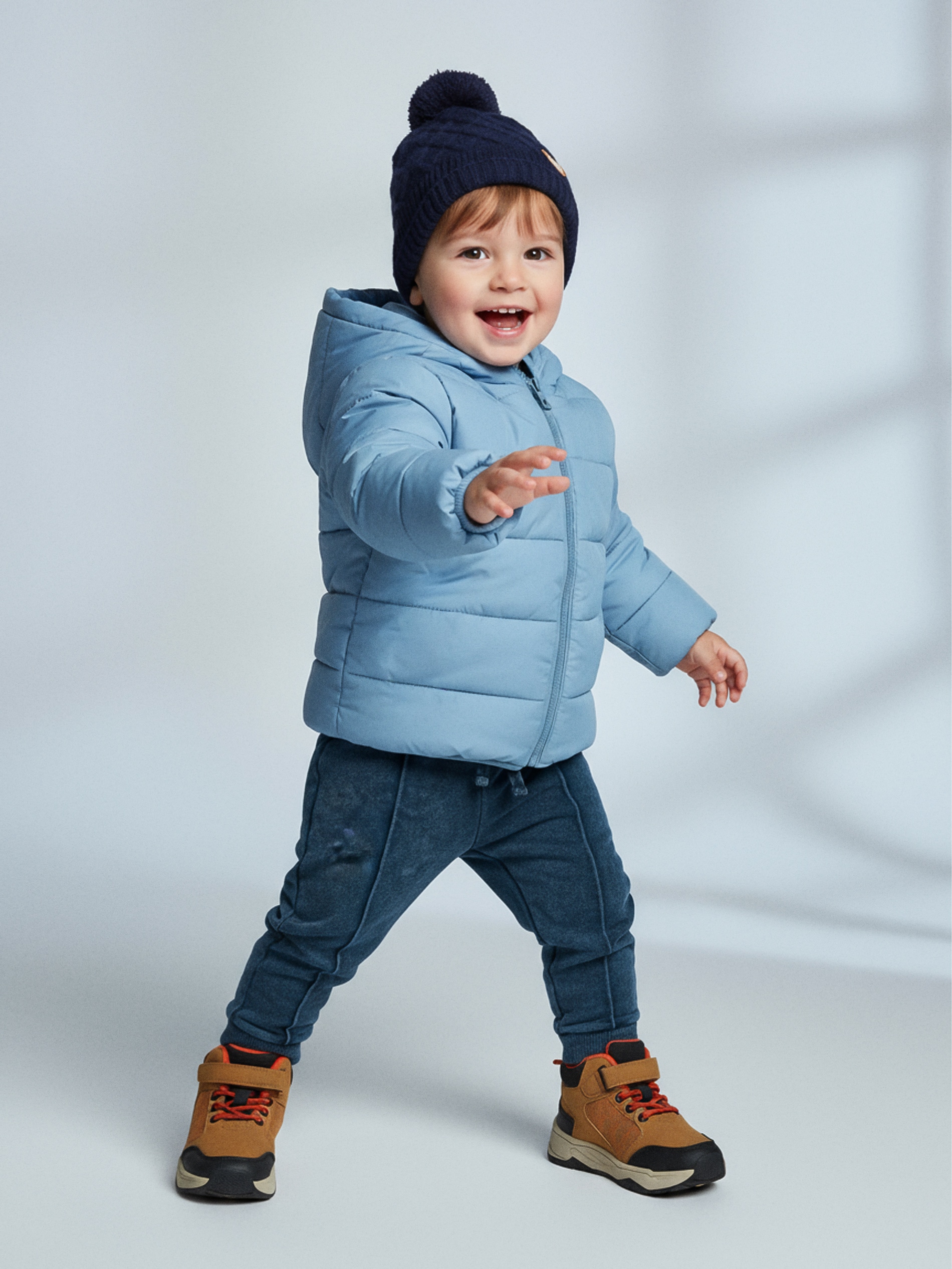 Sinsay - Pikowana kurtka z kapturem wykończona taśmą elastyczną - niebieski