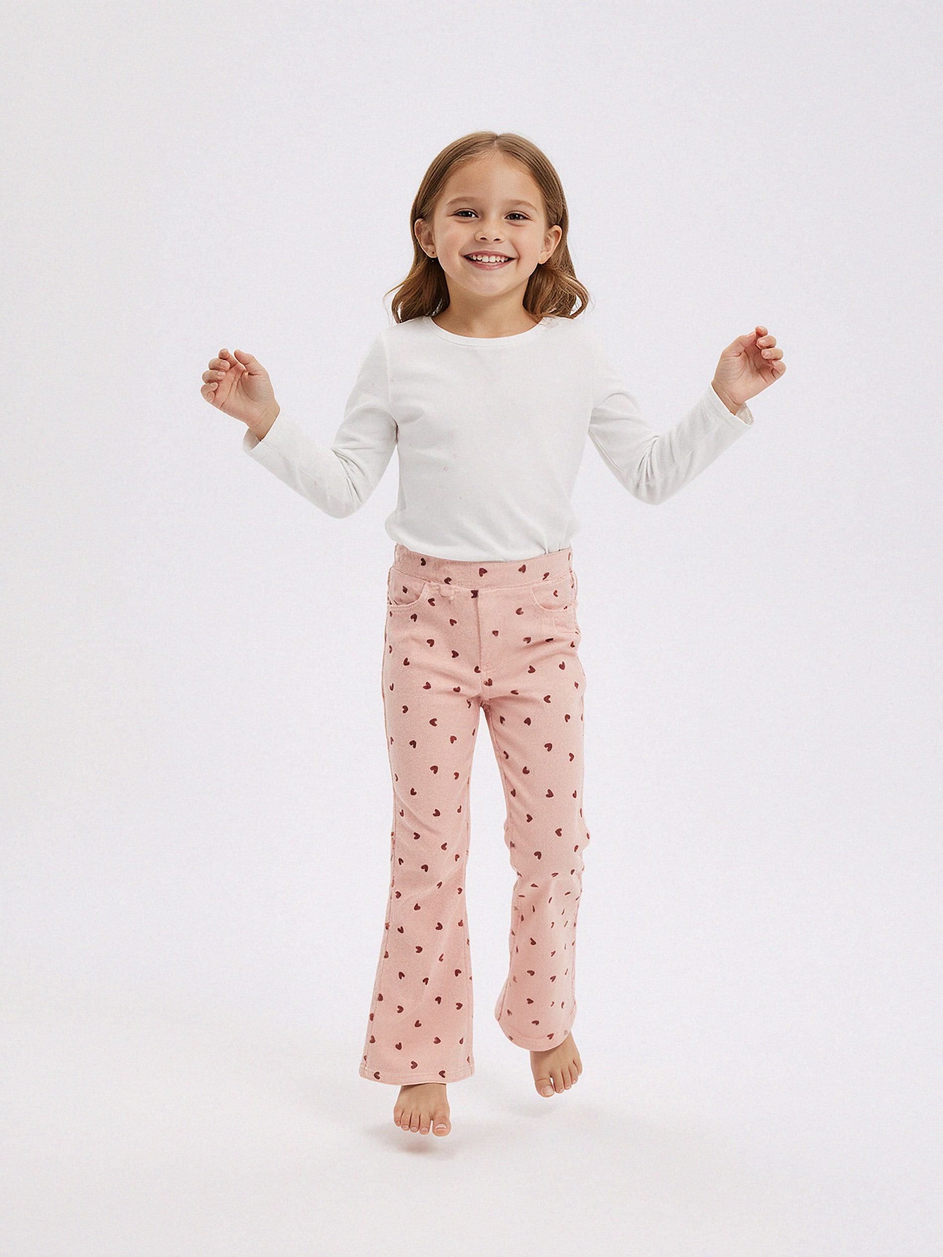 Sinsay - Prążkowane spodnie dzwony ze wzorkiem - różowy