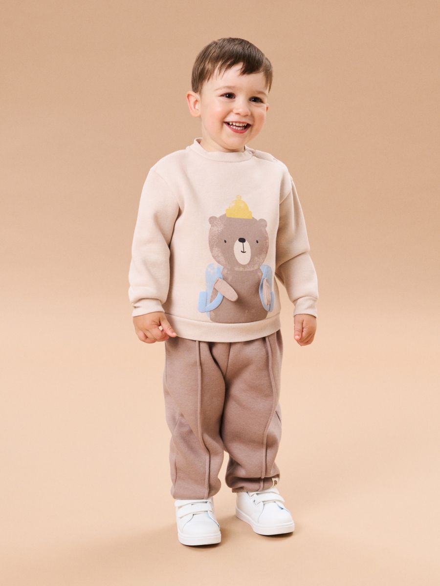 Bluza crewneck z nadrukiem - kremowy - SINSAY