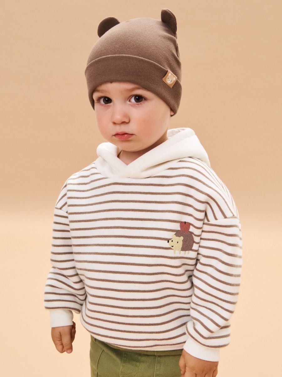 Cieplejsza bluza z kapturem - kremowy - SINSAY