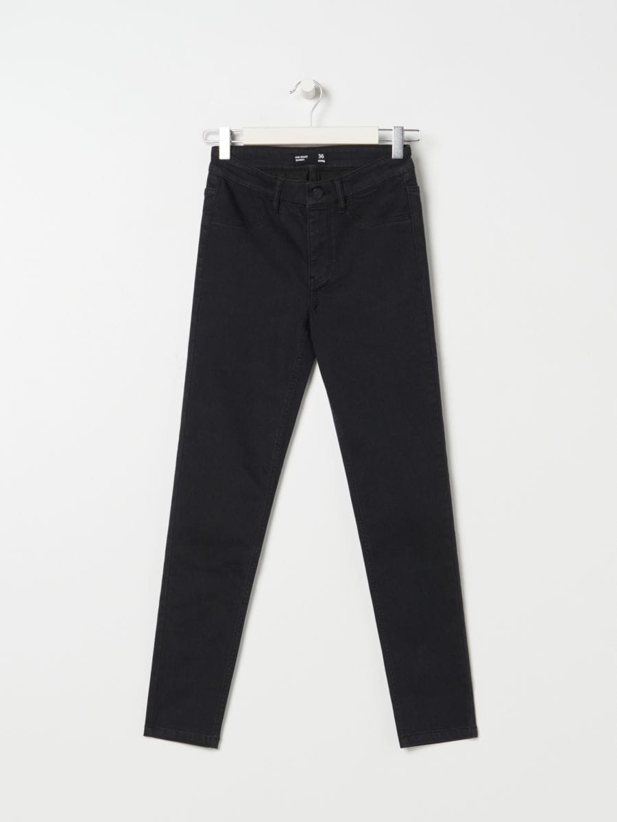 Вузькі джинси середньої посадки - чорний - SINSAY