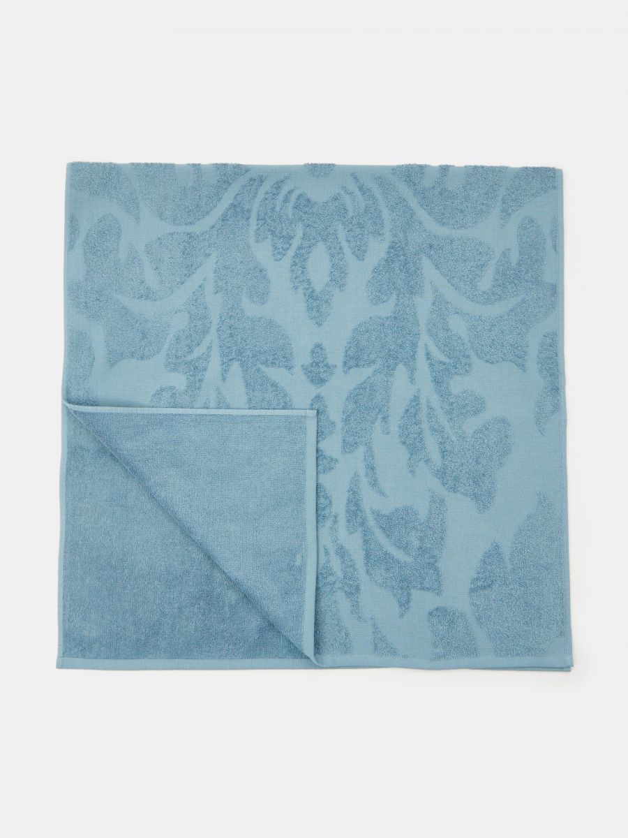 Ręcznik bawełniany we wzory - błękitny - SINSAY