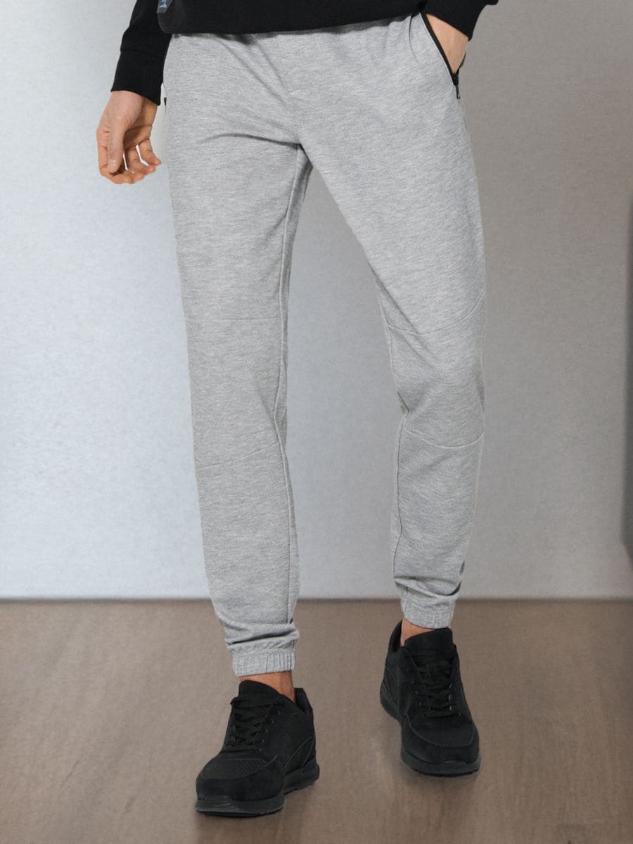 Pantaloni - gri deschis - SINSAY