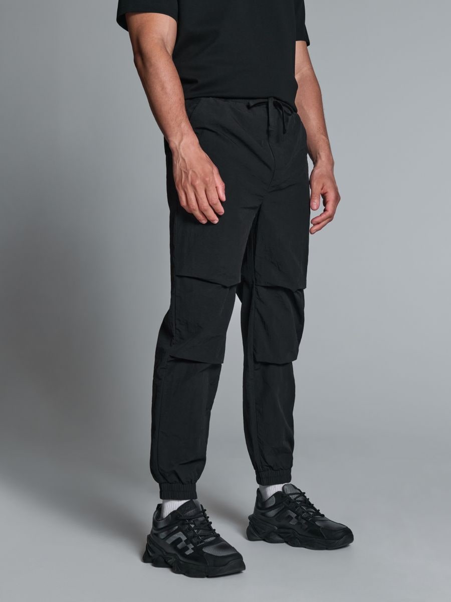 Kalhoty joggers - černá - SINSAY