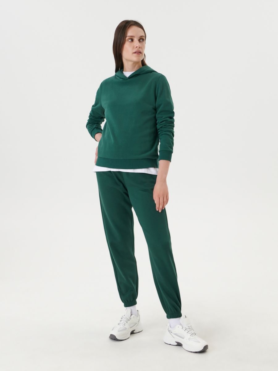 Spodnie dresowe - zielony - SINSAY