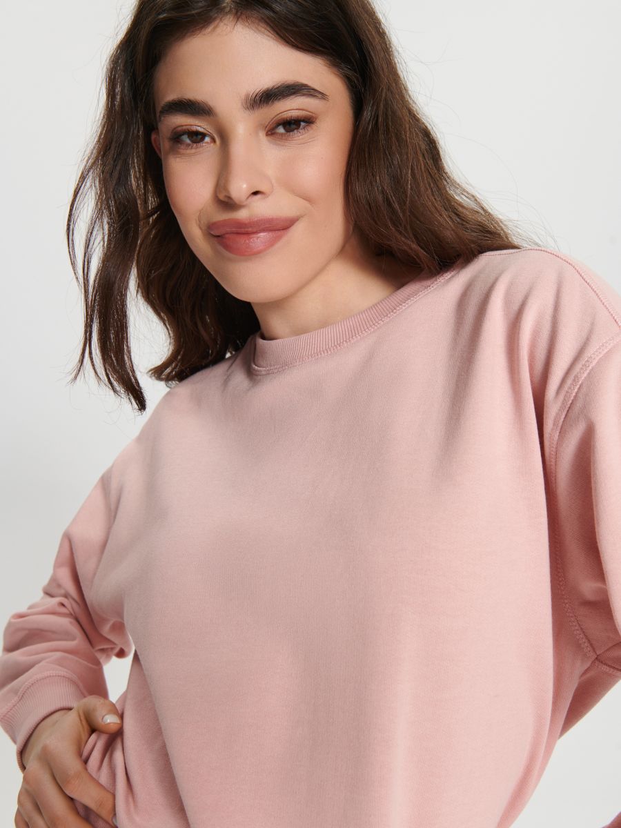 Bluză sport cu margini ripsate - roz-pastel - SINSAY