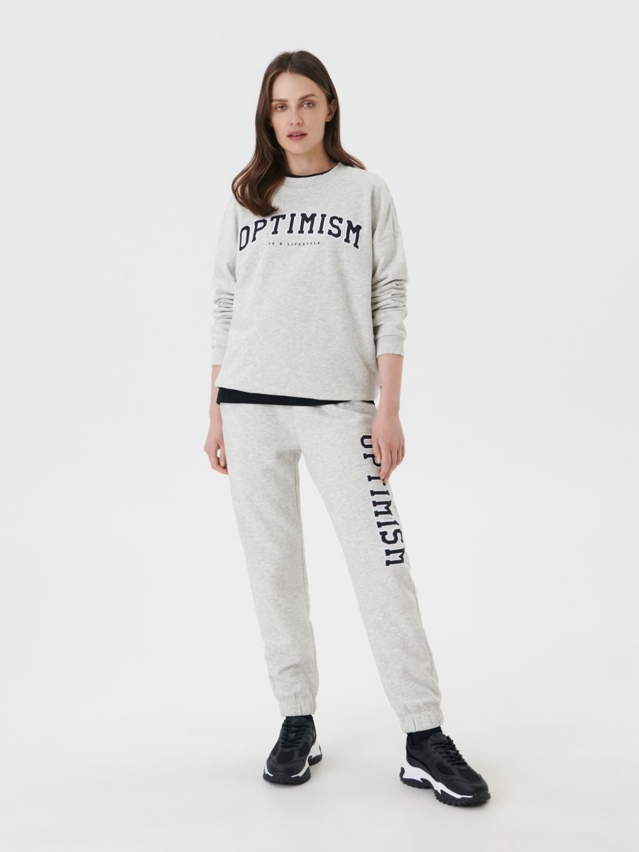 Oversized sweatshirt with slogan - light grey - SINSAY