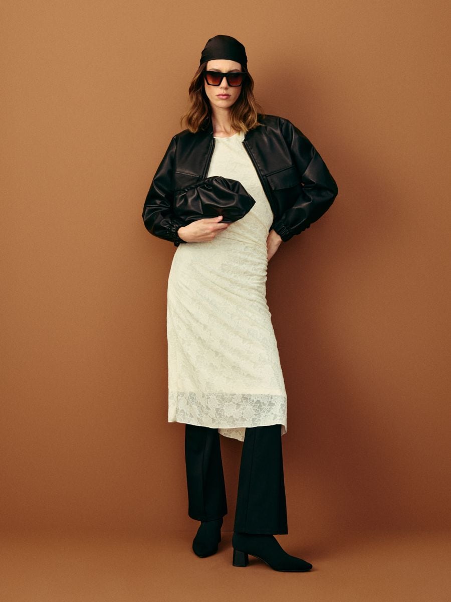 Pletene flare pantalone sa šavovima - crno - SINSAY