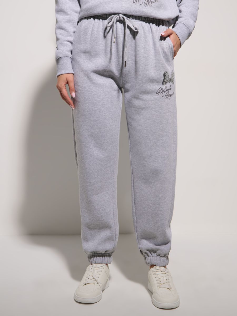 Jogger hlače Minnie Mouse - svetlo siva - SINSAY