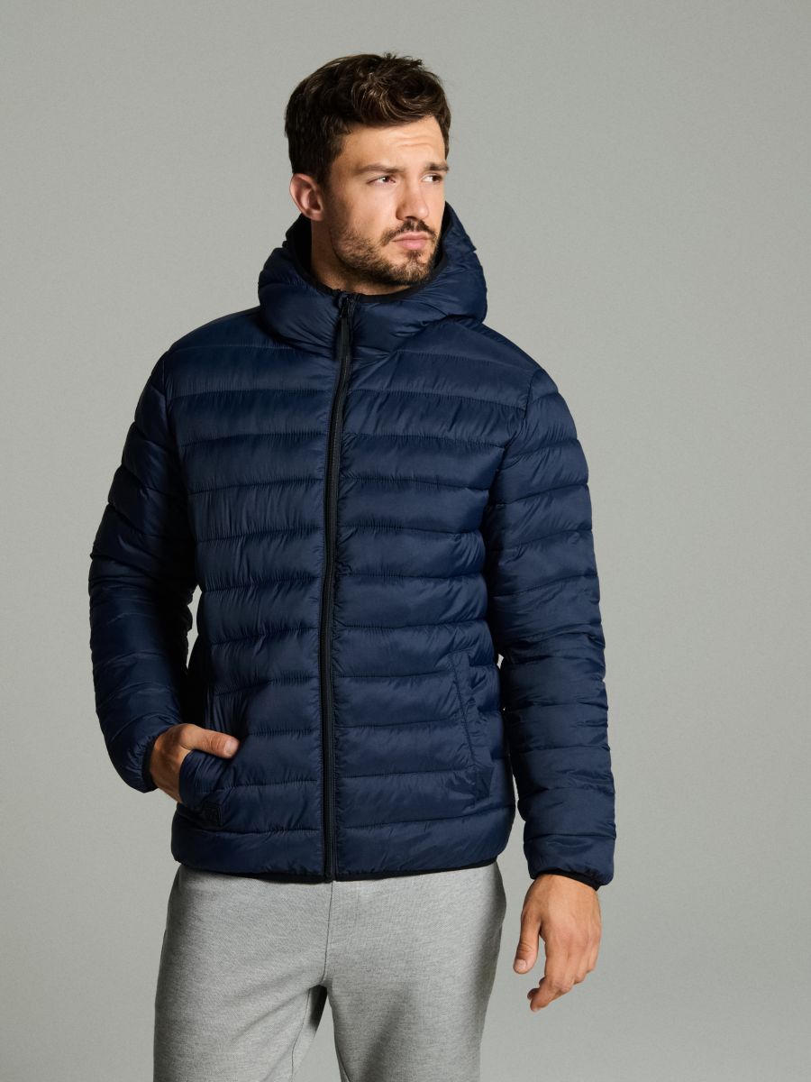 Pikowana kurtka puffer z kapturem - granatowy - SINSAY