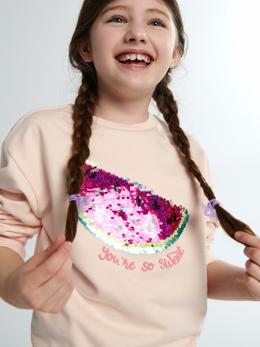 Sweatshirt mit Pailletten - Pastellrosa - SINSAY