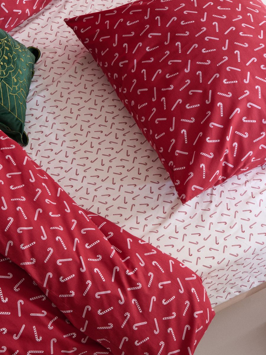 Prześcieradło bawełniane z gumką z motywem zimowym - kremowy - SINSAY