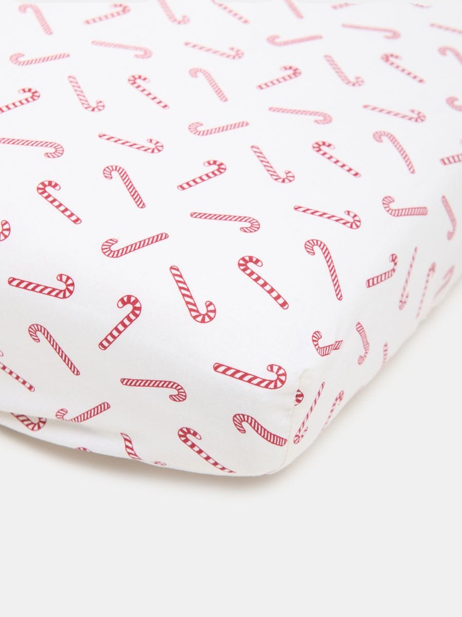 Pamučni čaršaf s rastezljivom gumicom - krem - SINSAY