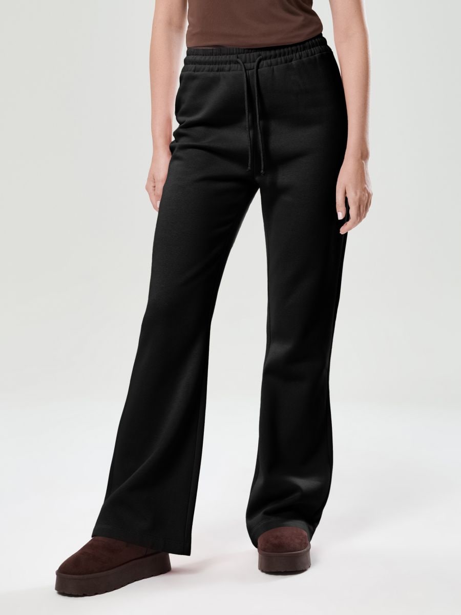 Pantaloni flare - negru - SINSAY