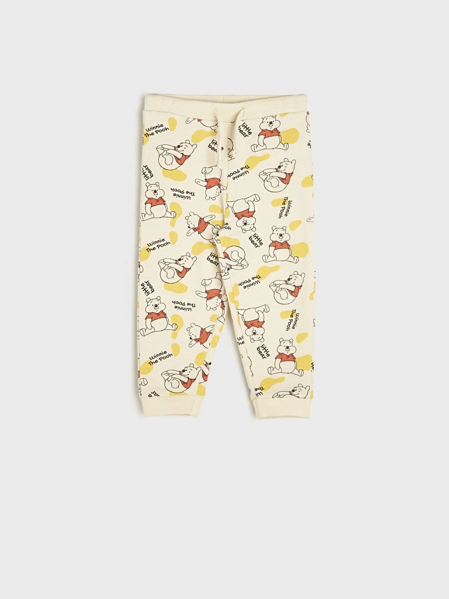 Спортен панталон Winnie the Pooh - бежово - SINSAY