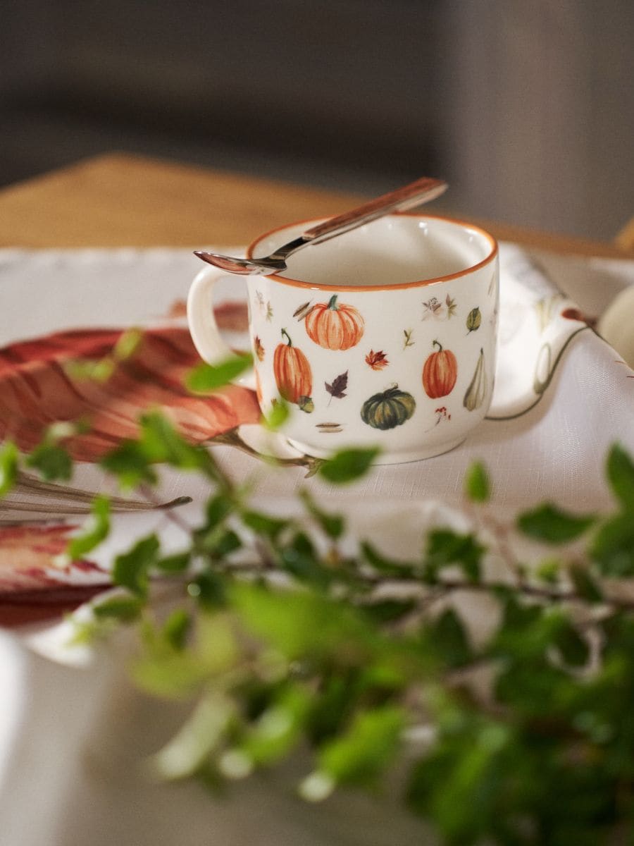 Ceramiczny kubek z uchem w dynie - wielobarwny - SINSAY