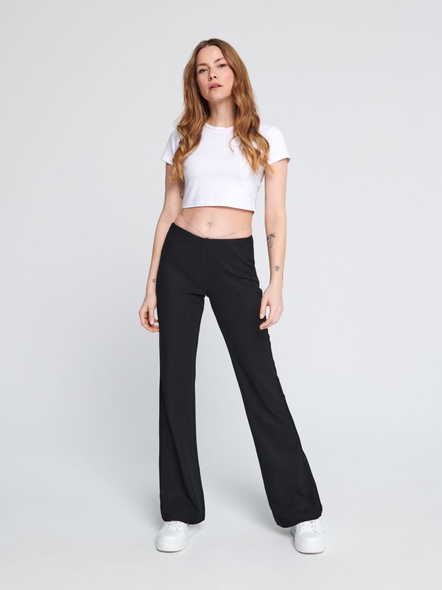 Elegant Woman In Silk Top And Balck Trousers With Full Make Up Smiling And  Posing Stock Photo  Download Image Now  iStock
