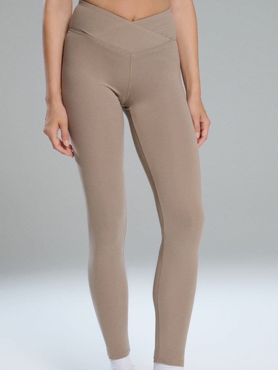 Legginsy Gym Hard - beżowy - SINSAY
