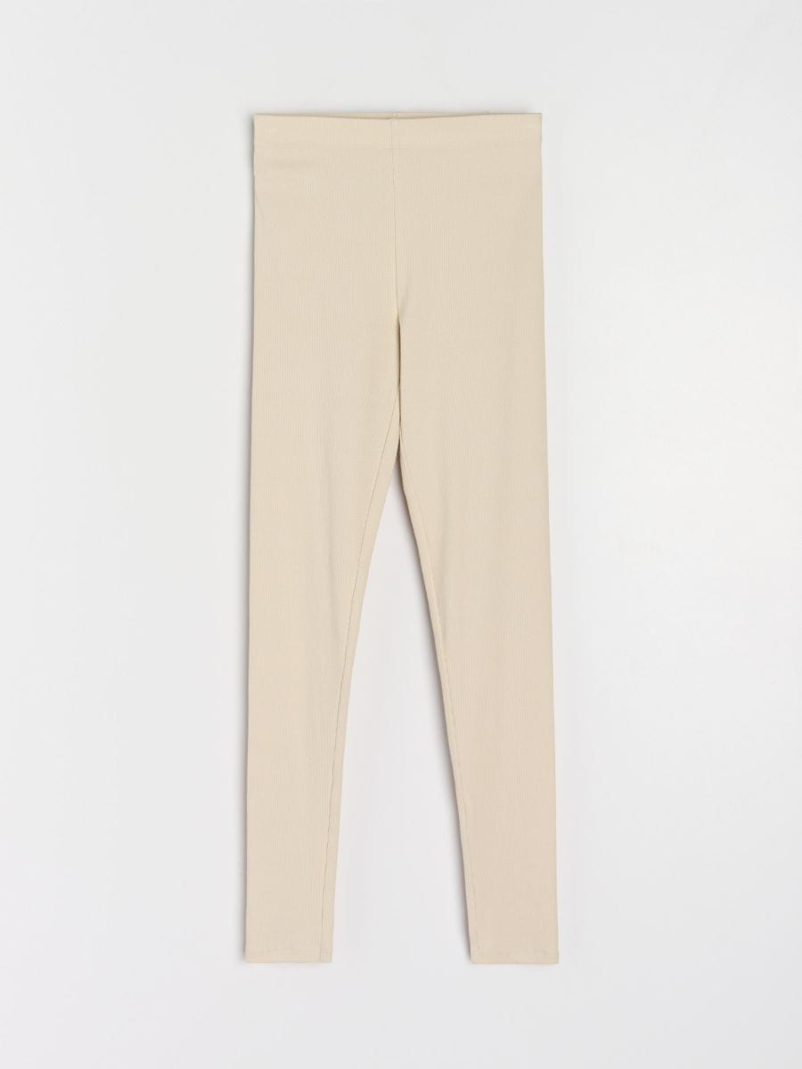 Prążkowane legginsy z gumką w pasie - kremowy - SINSAY