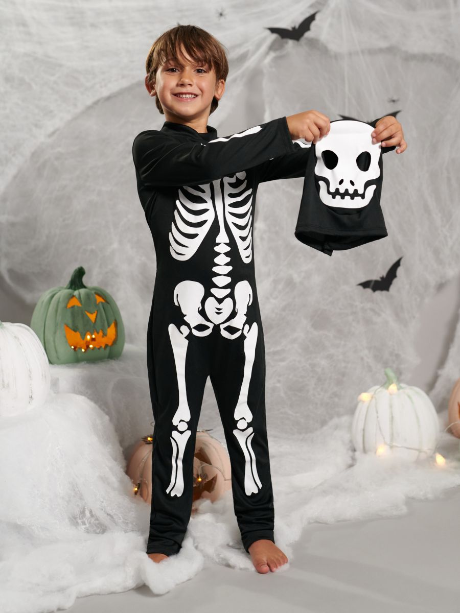 Premium Photo  A boy in a skeleton costume for halloween