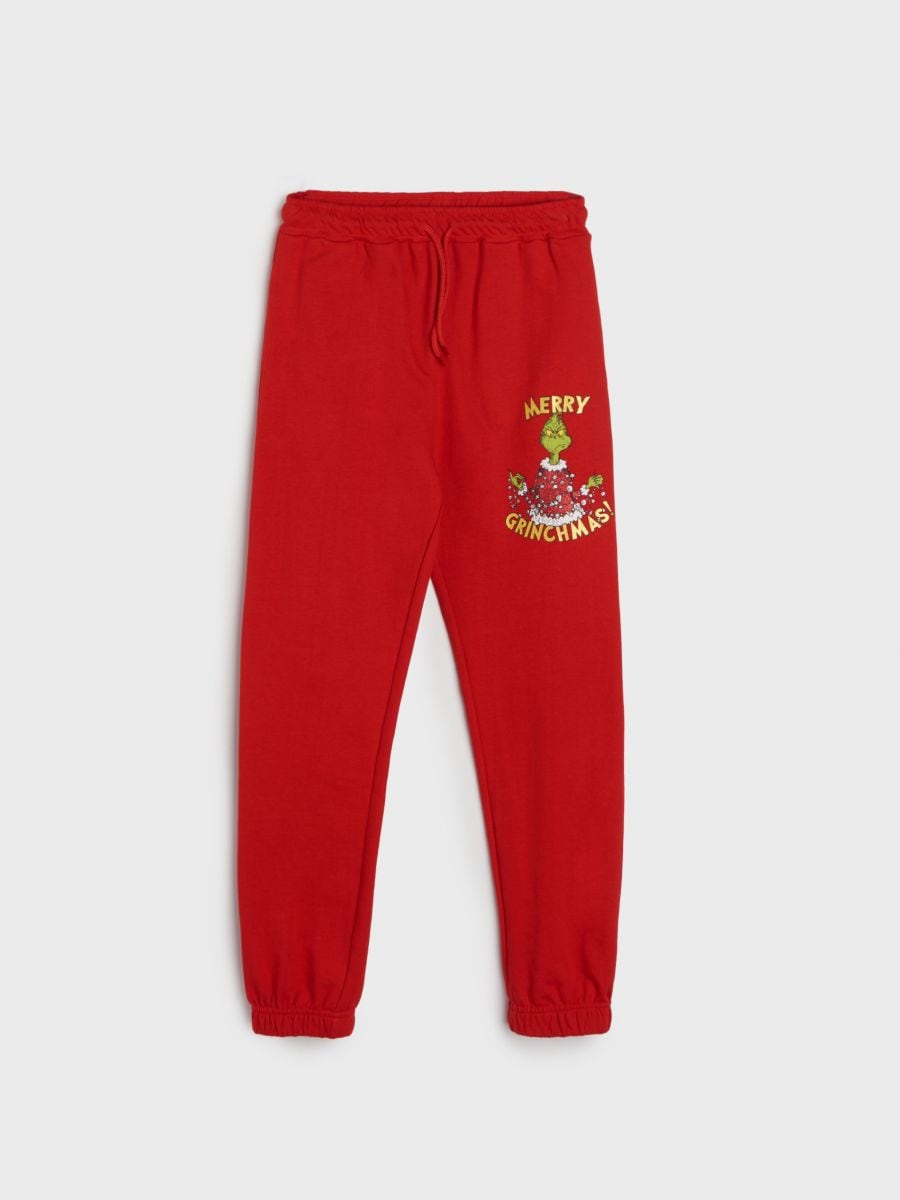 Spodnie dresowe Grinch - czerwony - SINSAY
