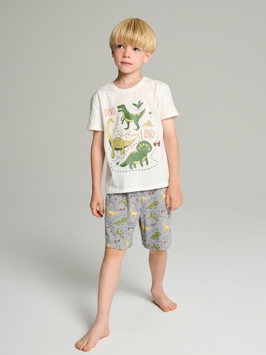 Pijama din două piese cu motiv de dinozauri - crem - SINSAY