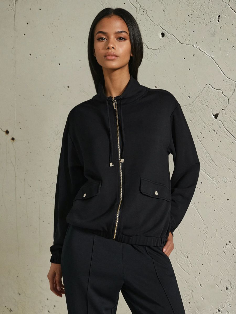 Rozpinana bluza ze stójką soft touch - czarny - SINSAY