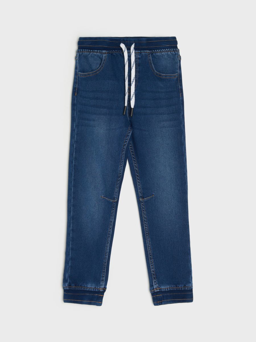 Jeansy jogger z efektem sprania - granatowy - SINSAY