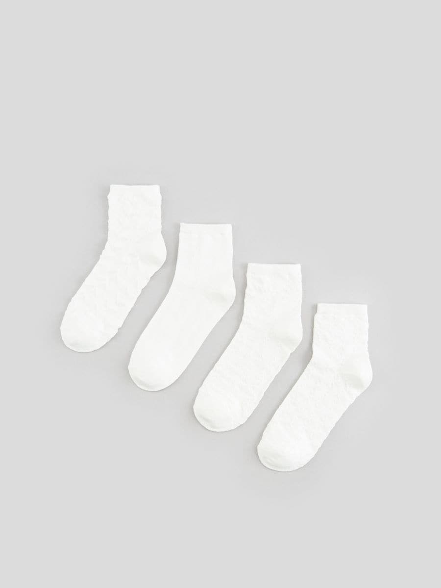 Komplet od 4 para čarapa - krem - SINSAY
