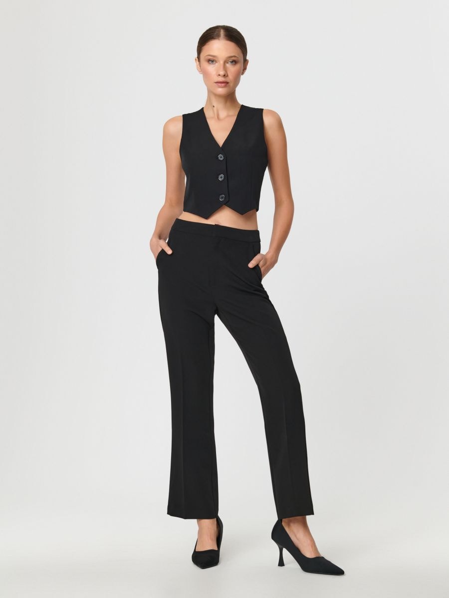 Trousers with pockets - black - SINSAY