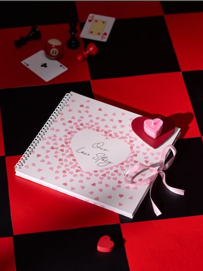 Fotoalbum südamekleebiste komplektiga