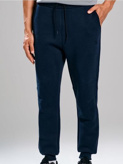 Teplákové kalhoty se širokými nohavicemi