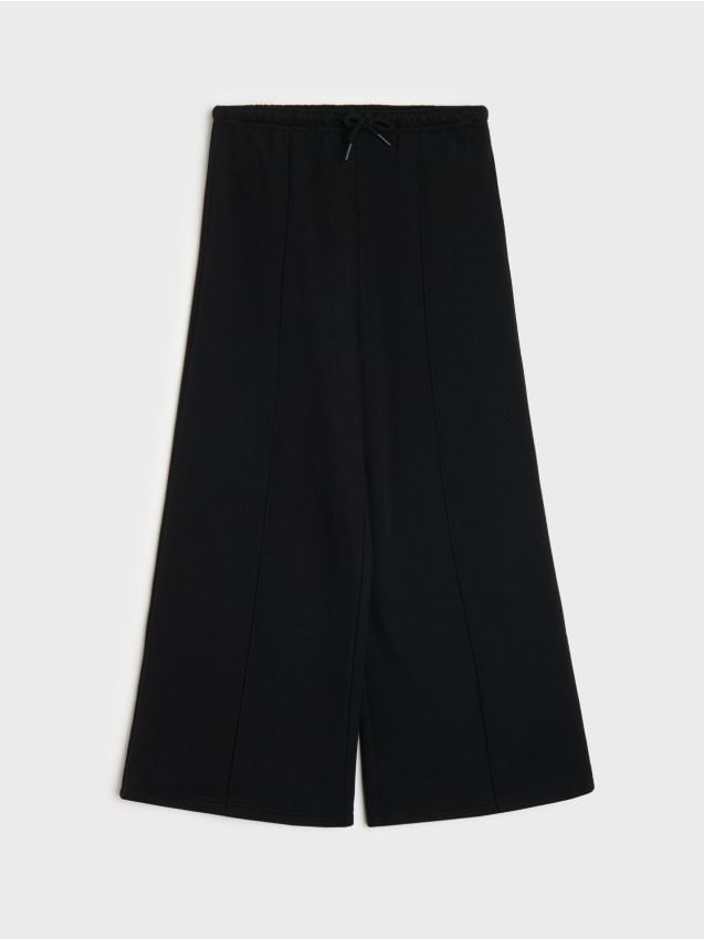Sinsay - Pantaloni de trening cu crac larg - negru