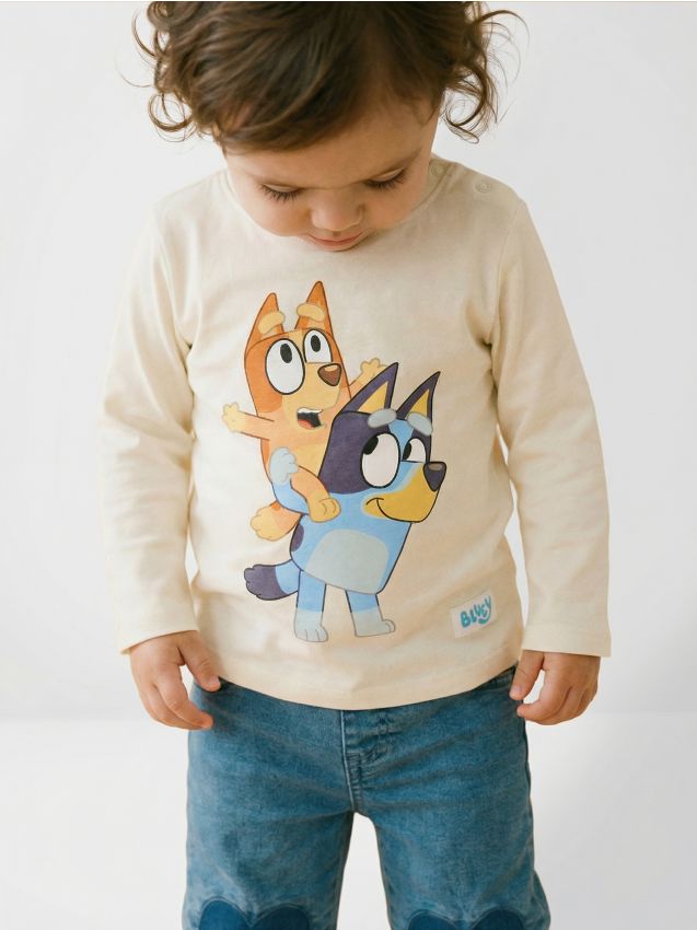 Sinsay - Tricou cu mânecă lungă Bluey - crem