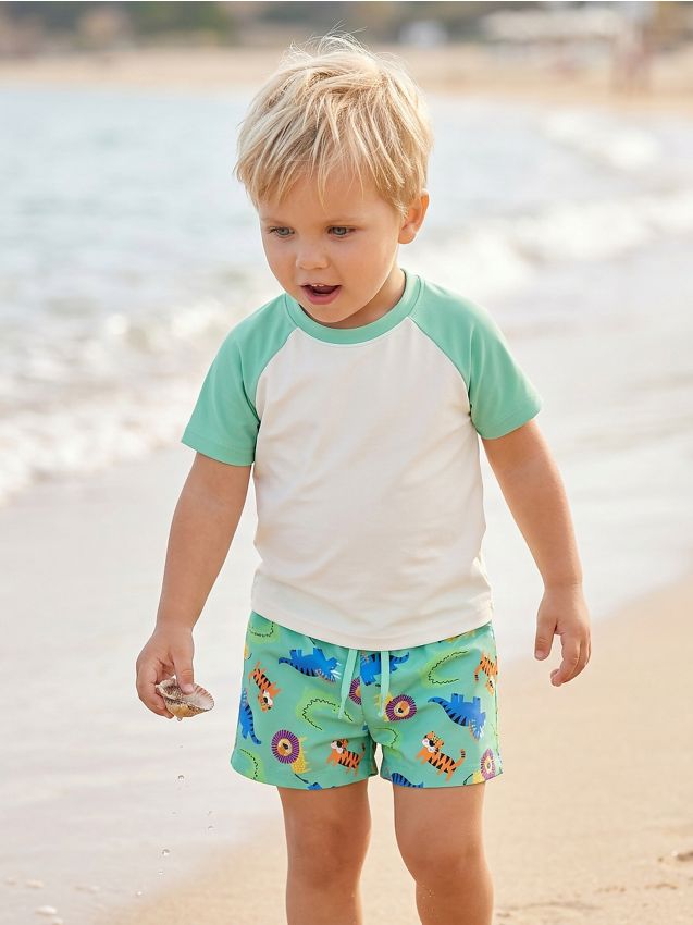 Sinsay - Șorturi de baie cu motiv de dinozauri - verde-pal